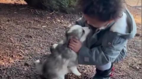 A boy and his puppy.. 😊