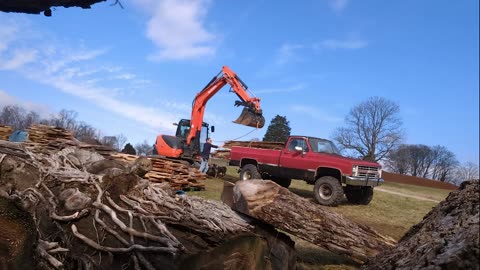 Kubota KX080 Loading Country Siding