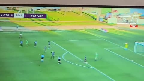 The goalkeeper concedes goal after attempting to head a 40-yard free kick