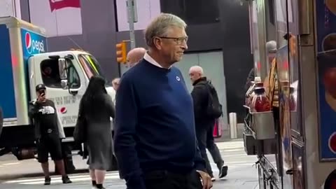 Bill Gates in public trying to look human............. doesnt even eat the hotdog