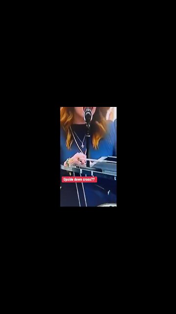 California Fire update: Woman Displays Upside-Down Cross. Why?