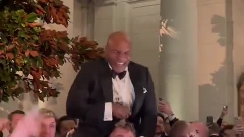 Mike Tyson, Jake Paul, and Evander Holyfield having fun at the inaugural ball2