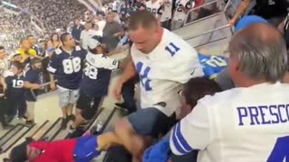 Fight breaks out between fans at a NFL game