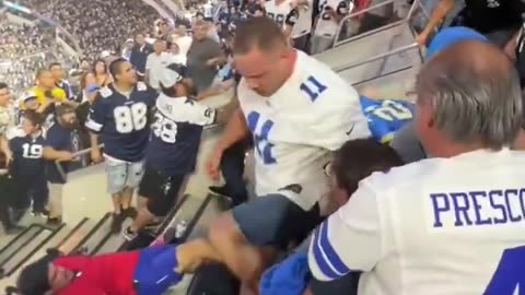 Fight breaks out between fans at a NFL game