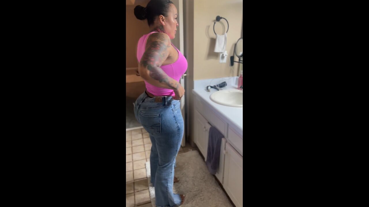 Thick woman trying on jeans