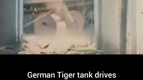 German Tiger tank drives through house unbelievable #Colourized footage 🇩🇪 🚛 🏠 🎥