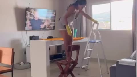 Woman Takes a Hard Fall Cleaning Light Fixture