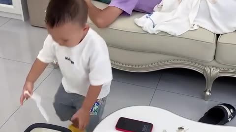 While dad is sleeping, this little guy keeps things in order at home!.hd