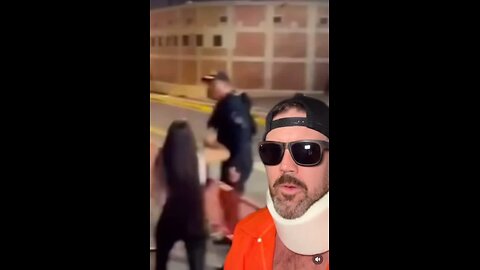 Cop Spits on Woman