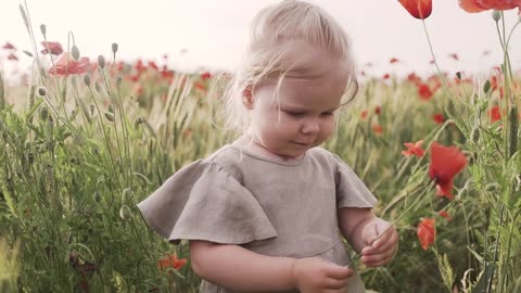 🌿✨ Adorable Baby Enjoying Nature! 🌸👶