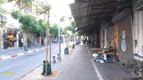 Walking tour in Jaffa via Jerusalem Street, Marina, and Clock Square..