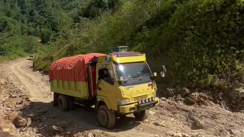 the action of a young driver over a steep, sharp incline