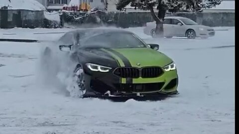 BMW M850i snow Drift