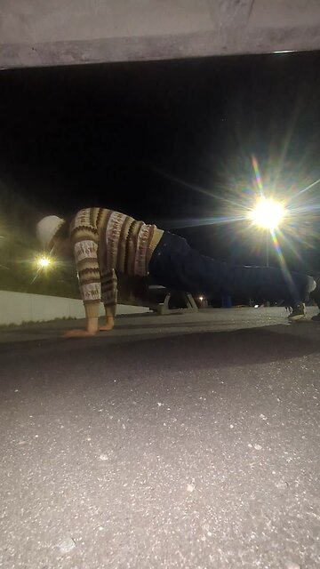 Doing spiderman pushups