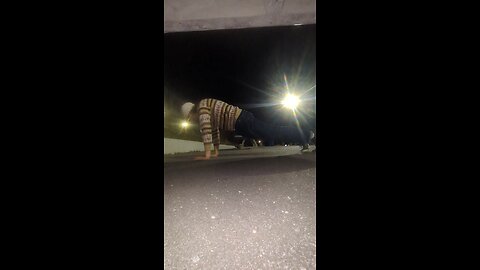 Doing spiderman pushups