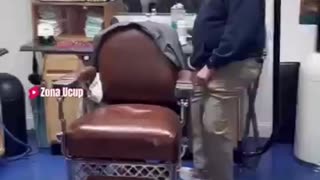 Barber's Genius Hack: Floating Chair Revolutionizes Haircuts!