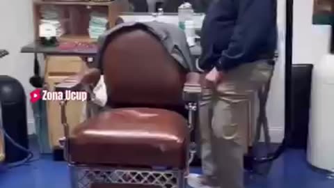 Barber's Genius Hack: Floating Chair Revolutionizes Haircuts!