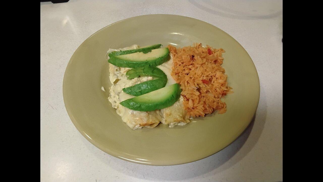 Cream Cheese Chicken, and Green Chili Enchiladas with Spanish Rice