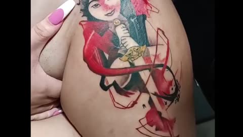 tatoo on thigh