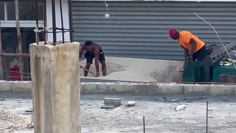 Workers Shovel in Sync