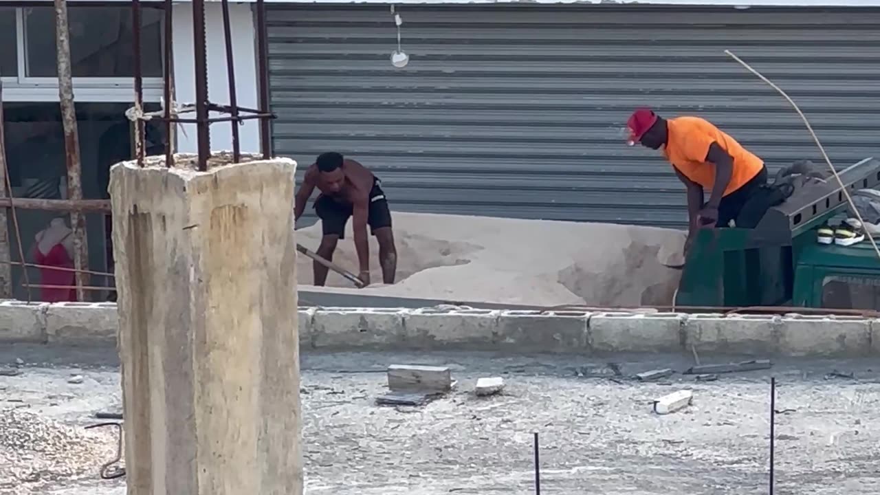 Workers Shovel in Sync