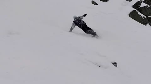 Snowboarder Takes A Few Tumbles