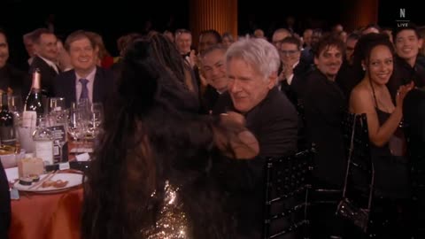 Harrison Ford eating during the intro of the SAG Awards