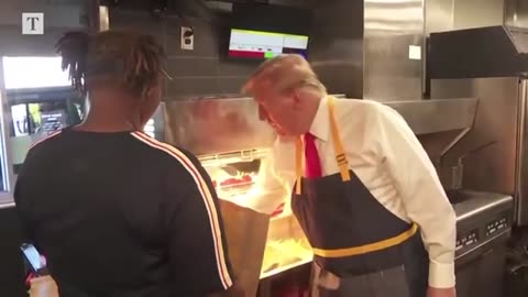 Donald Trump surprises McDonald's customers at a drive-through