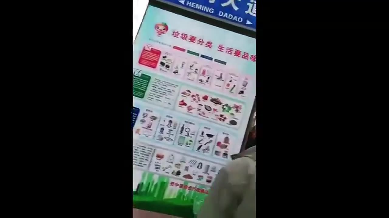 CHINESE KID PUTS A FIRECRACKER DOWN A MANHOLE RIGHT BY SOME PARKED CARS. KABLOOM!