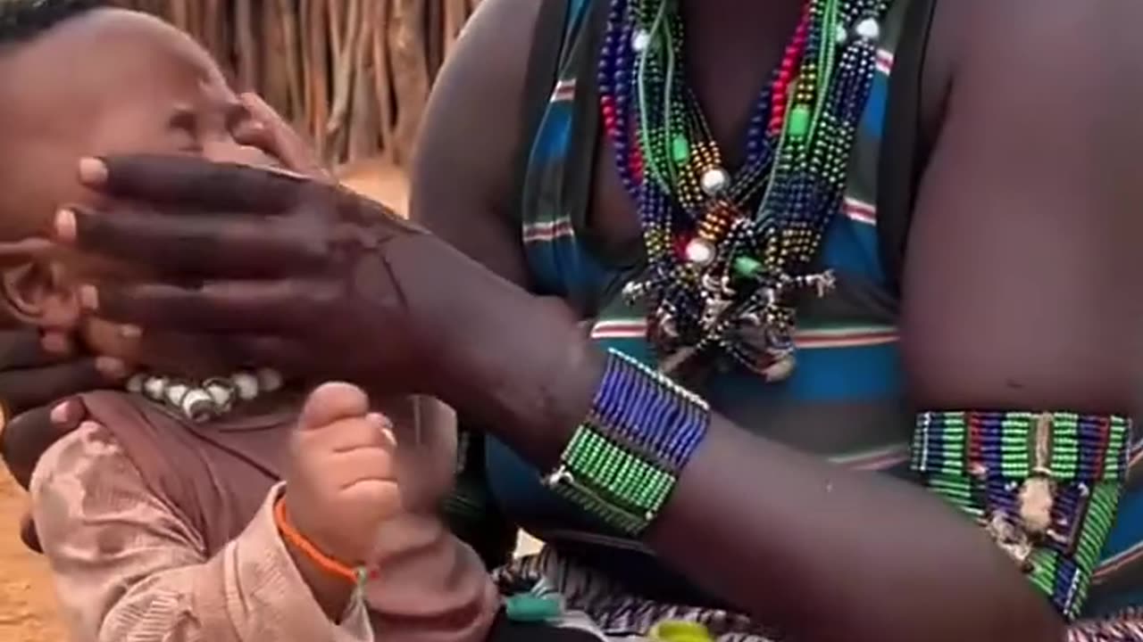 African women gave bath to child