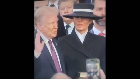 Trump Swore In Without Hand On Bible & Melania's Outfit?