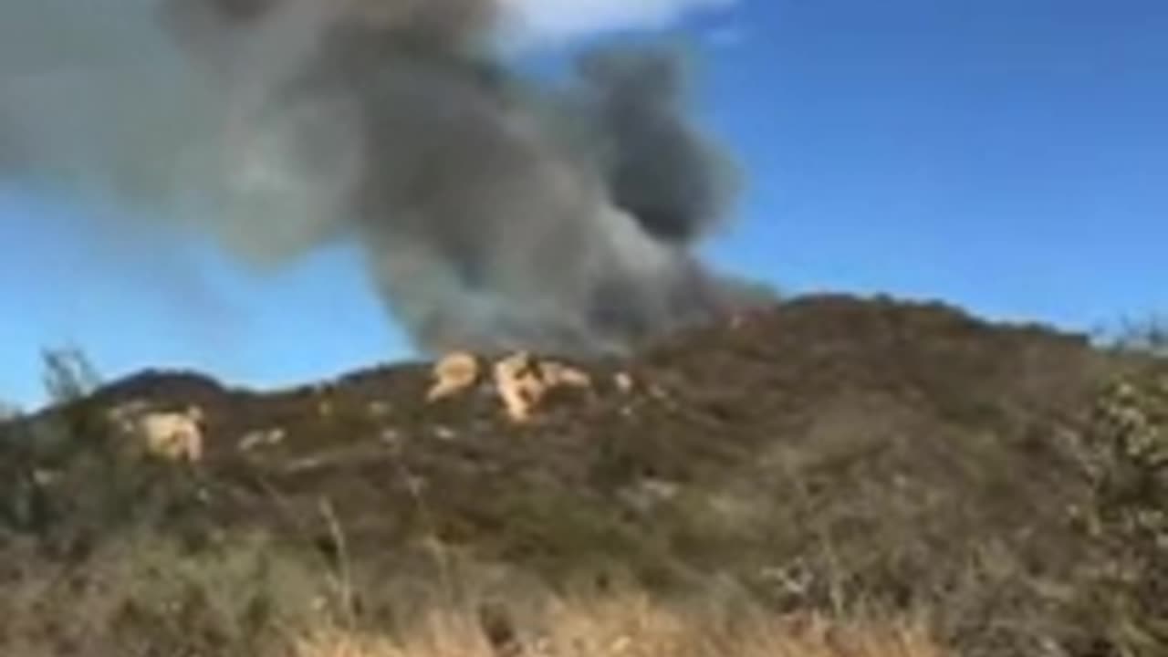 FOOTAGE OF YOUNG HIKERS RUNNING AWAY FROM ORIGIN OF PALISADES FIRE