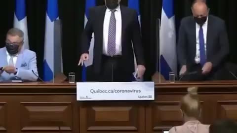 Quebec Premier Francois Legault flashes FREEMASONIC 666 HAND SIGN before sitting down