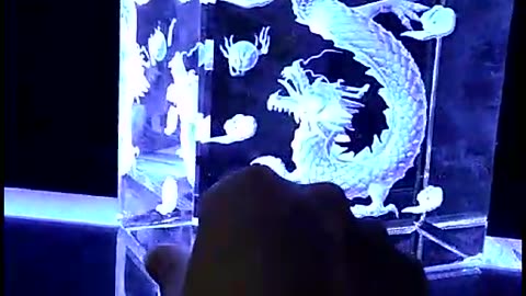 Laser engraving, dragon pattern. Use LED blue light as a foil, the visual effect is beautiful!