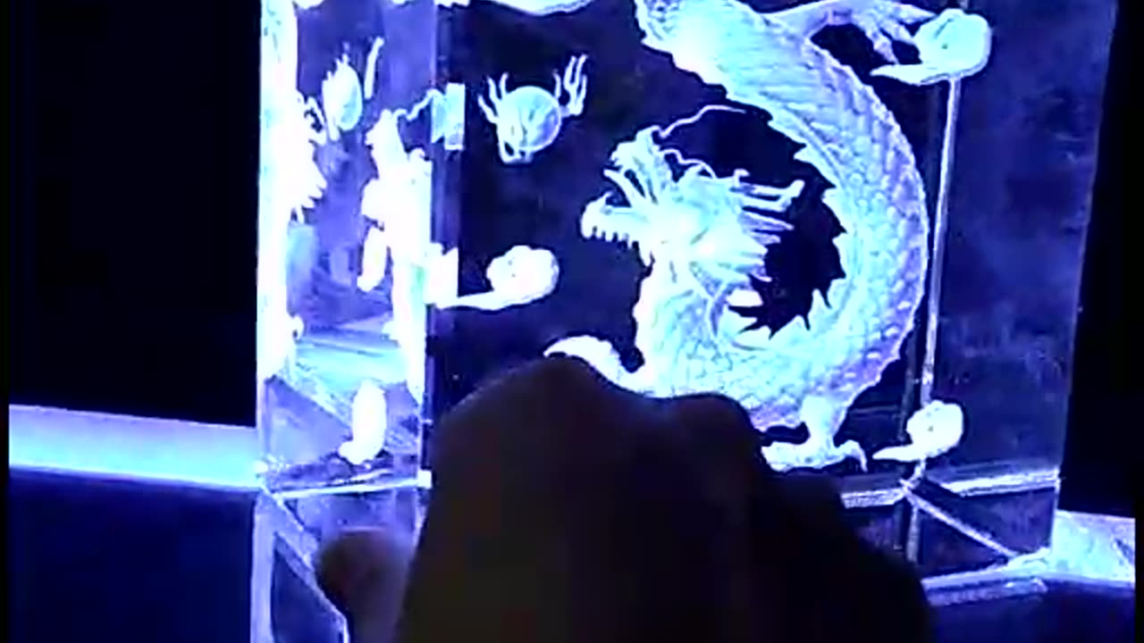 Laser engraving, dragon pattern. Use LED blue light as a foil, the visual effect is beautiful!