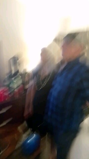 Grandparents kiss at midnight