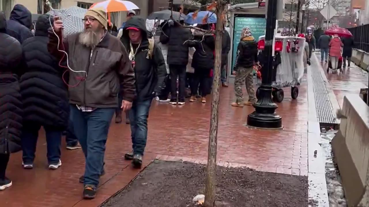 Capital One Arena, D.C., THOUSANDS of patriots in the rain lined up to get into the rally!