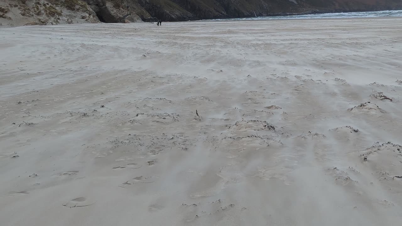 Wind pushing sand