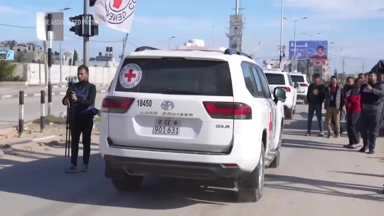 Red cross convoy drives towards Gaza City ahead of expected hostage release