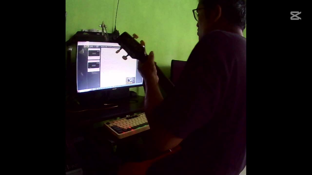 I'm playing 'Somewhere Over the Rainbow' by Israel Kamakawiwo'ole on my ukulele.