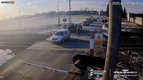 Wild Video Shows A Rescue Of A Woman's Car Stuck On The Train Tracks In Poland