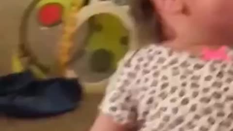 Funny baby reaction playing with parents