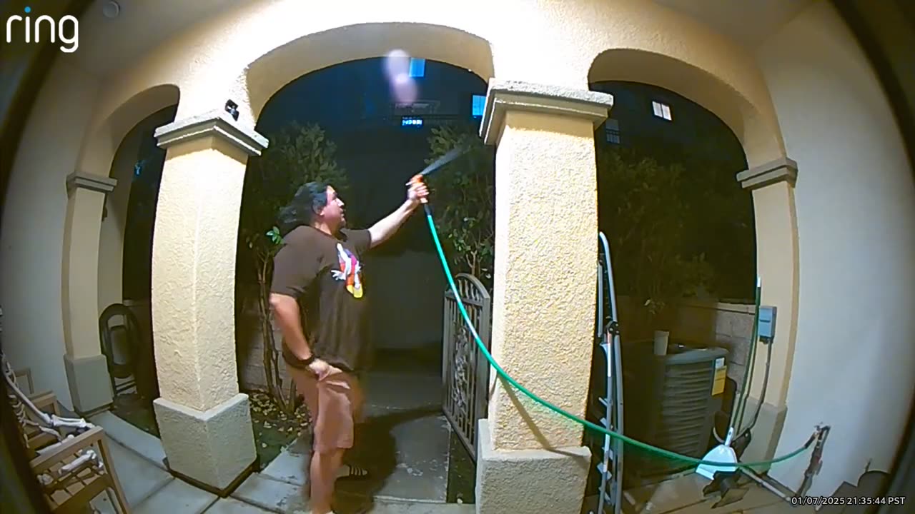 Transformer Blows While Man Is Hosing Down Bushes