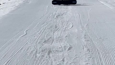 Snowboarder Refuses to Let Go of Lift