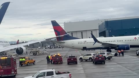 Two Planes Tap At Seattle Airport