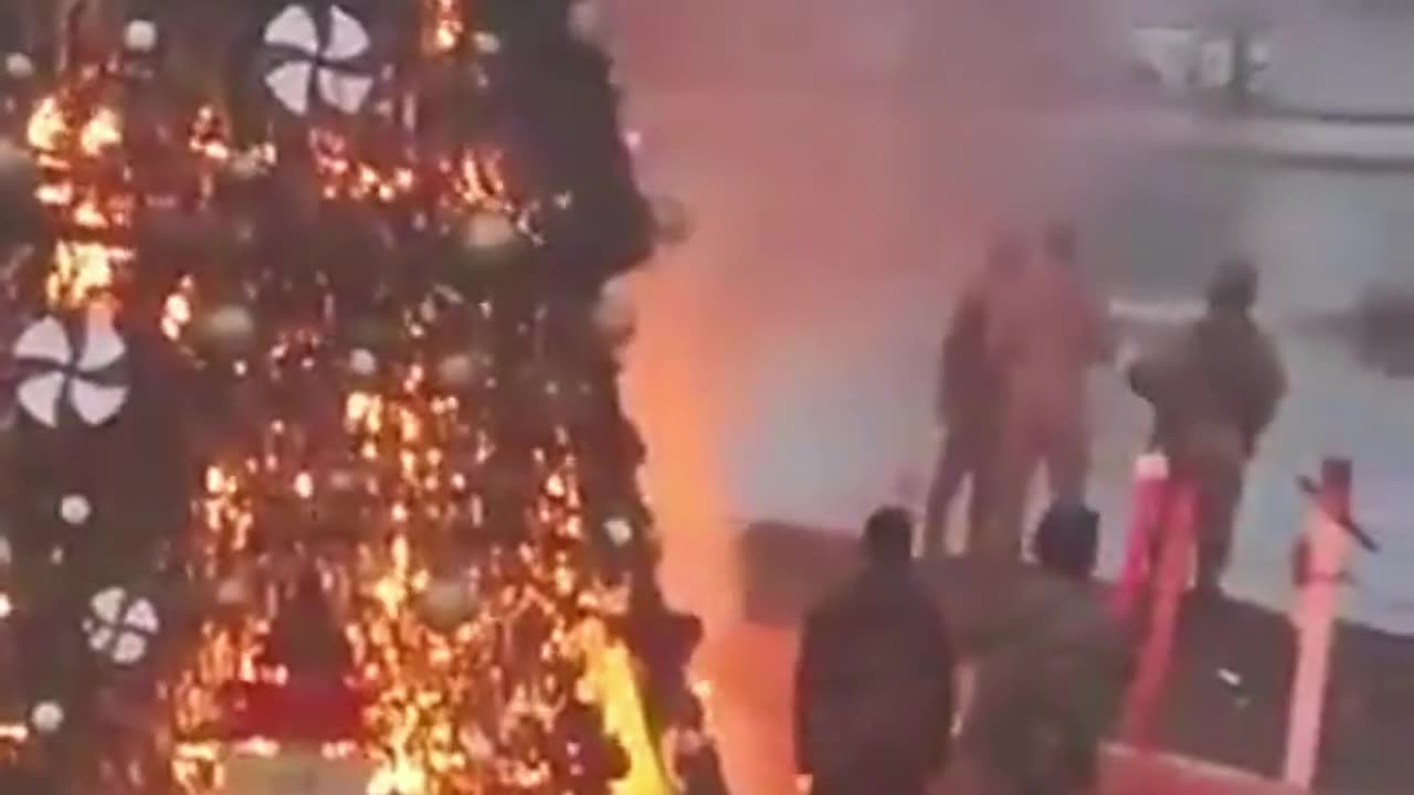 A Christian Celebration Tree being burned in Post Assad Syria