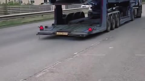 Open Car Hauler Thrill Ride: Feel the Freedom of the Open Trailer!