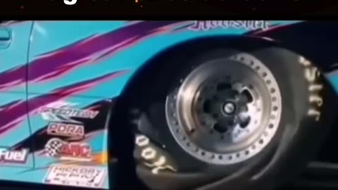 Drag car tire at launch