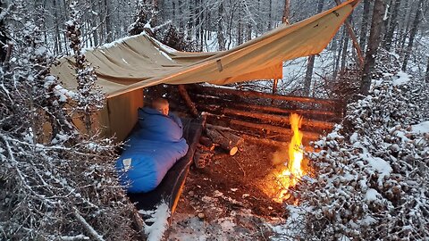 Winter Camping in Snow Storm with Survival Shelter & Bushcraft Cot.WinterCamping #SnowStorm #Surviva