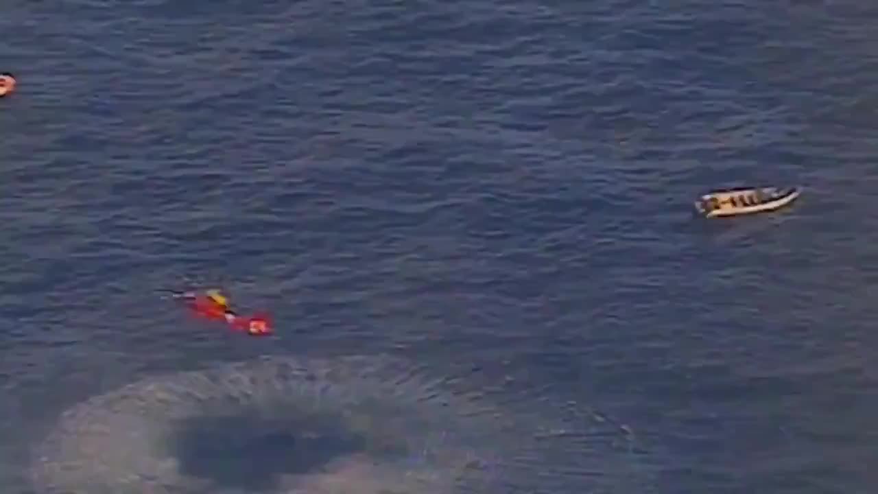 New DHS footage shows a Coast Guard MH-65E closing in on a cartel fast boat in the Eastern Pacific